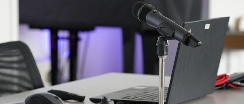 computer equipment and microphone on table