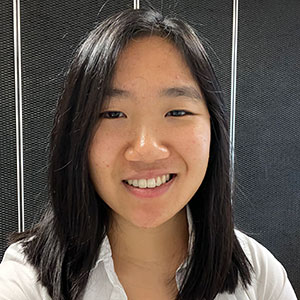 Smiling Asian woman with shoulder length hair