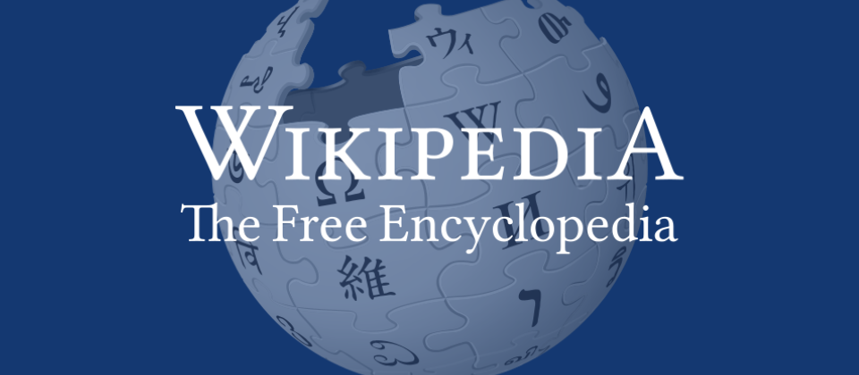 Wikipedia logo on dark blue backdrop.