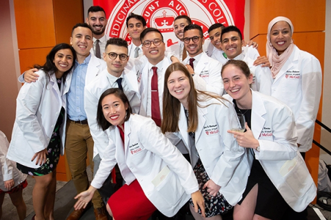 learners at white coat ceremony